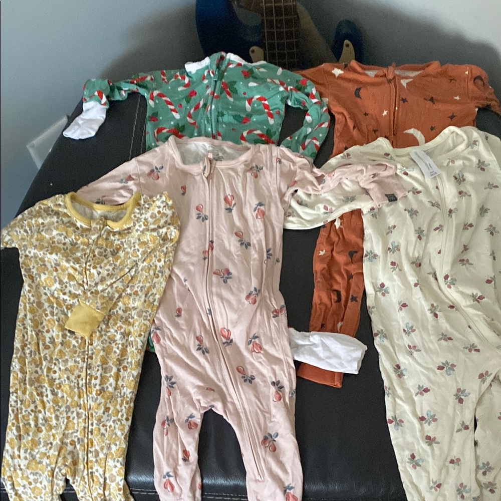 Assorted Baby Onesies with Floral and Holiday Patterns